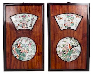 A Pair of Chinese Famille Rose Porcelain Insets Hardwood Wall Panels 
Height 25 1/2 x width 15 1/4 in., 65 x 39 cm. 