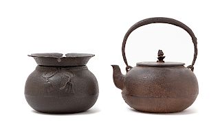 Two Japanese Cast Iron Tea Wares
Height of teapot 7 3/4 x width 6 in., 20 x 15 cm. 