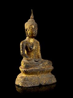 A Thai Gilt Bronze Figure of Buddha
Height 7 1/2 in., 19 cm. 
