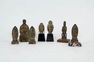 Group of 7 Small Metal Buddhist Figures.
