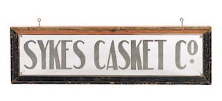 Sykes Casket Co Glass Advertising Sign