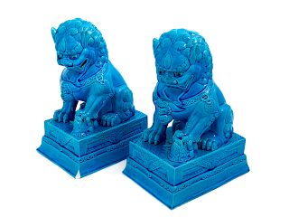A Pair of Chinese Turquoise Glazed Porcelain Figures of Fu Lions
Height 10 7/8 in., 28 cm. 