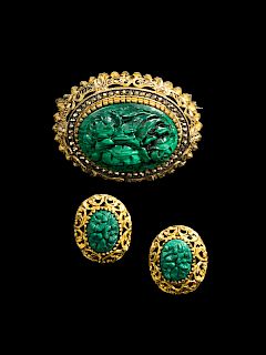 A Chinese Malachite Brooch and a Pair of Earclips
Brooch: length 1 1/2 in., 3.8 cm. 