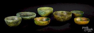 Seven ancient Near Eastern bronze bowls