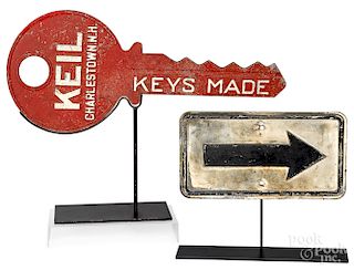 Key trade sign, together with an arrow sign