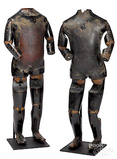 Pair of wood and leather articulated mannequins