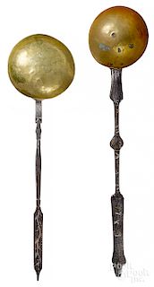 Two wrought iron and brass ladles