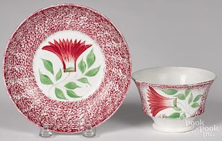 Purple red spatter thistle cup and saucer