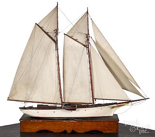 Painted schooner sailboat model