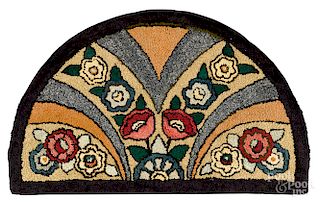 Demilune floral hooked rug