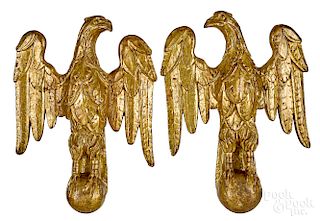 Pair of carved and gilded eagles