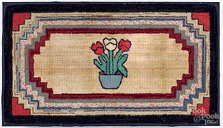 Hooked rug with potted tulips, early 20th c.
