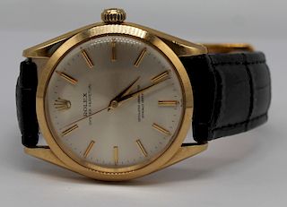JEWELRY. Men's Rolex Oyster Perpetual 18kt Watch.