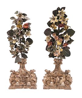 A Pair of Italian Carved and Polychromed Wood Urns inset with Polychromed Tole Flowers.
19TH CENTURY
Height 28 inches.