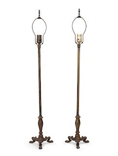 A Pair of Italian Gilt Metal Candlesticks
EARLY 20TH CENTURY
on tripod base, now mounted as lamps.
Height 35 1/2 inches.