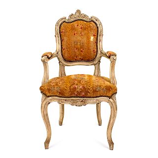 A Louis XV Style Carved Diminutive Fauteuil
LATE 18TH / EARLY 19TH CENTURY 
Height 30 1/2 inches.