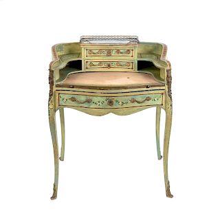 A Louis XV Style Painted Bureau de Dame
19TH CENTURY
with gilt metal mounts, marble inset top shelf with three-quarter pierced gallery.
Height 38 x wi