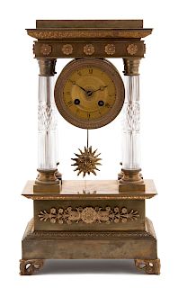 A Charles X Gilt Bronze and Crystal Portico Clock