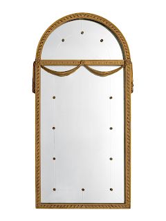 A Louis XVI Style Giltwood Pier Mirror
54 1/2 X 27 1/2 inches.