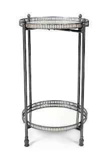 A Neoclassical Style Steel Side Table
Height 29 1/2 x diameter 15 3/4 inches.