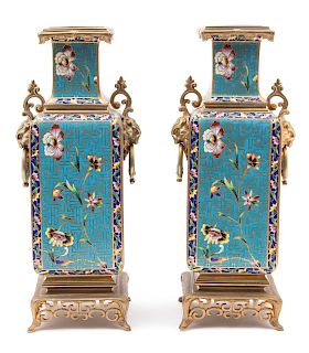 A Pair of French Japonisme Champleve Enamel and Gilt Bronze Vases Height 12 1/2 inches.
Height 12 1/2 inches.