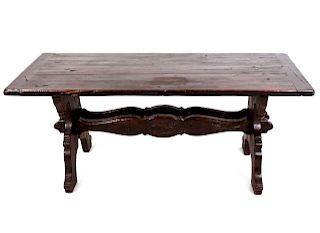A Jacobean Style Stained Oak Trestle Table
LATE 19TH/EARLY 20TH CENTURY
Height 30 x width 71 x depth 31 1/2 inches.