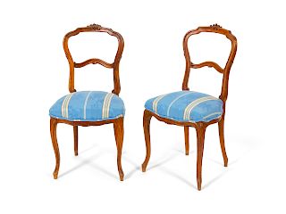 A Pair of Victorian Carved Walnut Lady's Chairs