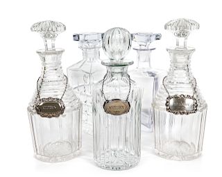 A Group of Five Glass Decanters
Height of tallest 10 1/2 inches.