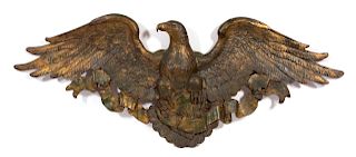 An American Composite Gilt Painted Wall Hanging of a Spread Winged Eagle 
Height 35 x width 84 x depth 6 1/2 inches.