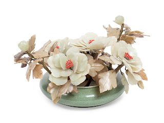 A Chinese Carved Hardstone Floral Arrangement
Height 9 inches x diameter 14 inches.