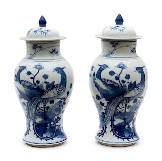 A Pair of Chinese Blue and White Porcelain Lidded Jars
Height 10 3/4 inches.