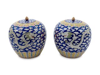 A Pair of Chinese Lidded Ginger Jars
Height 9 1/4 inches.