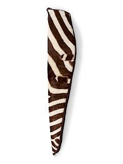 A Zebra Skin Rifle Carrying Case
Length 50 inches.