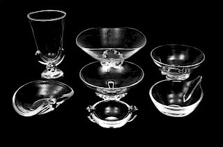 A Group of Seven Steuben Crystal Articles
20TH CENTURY
comprising three footed bowls, three smaller bowls and a vase.
Height of tallest 8 3/4 inches.