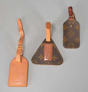 Group of Louis Vuitton monogram luggage tags
