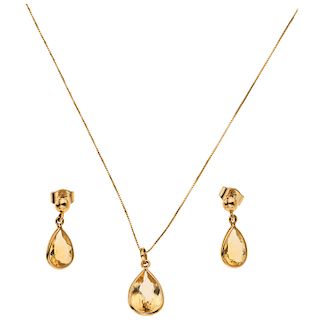 A citrin 18K yellow gold choker, pendant and pair of earrings set.