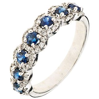 A sapphire and diamond 18K white gold ring.