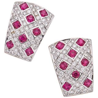 A ruby and diamond 18K white gold pair of earrings.