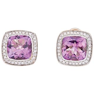 An amethyst and diamond 18K yellow and white gold pair of earrings. 