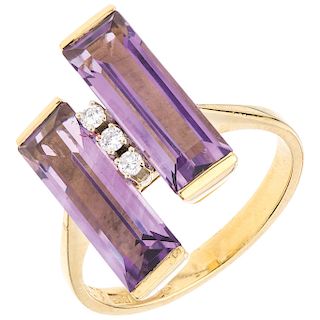An amethyst and diamond 18K yellow gold ring. 