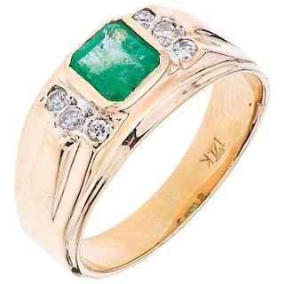An emerald and diamond 14K yellow gold ring. 