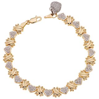A diamond 14K yellow gold bracelet.