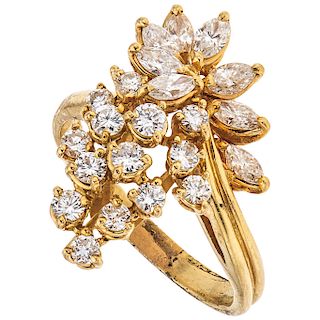 A diamond 16K yellow gold ring.