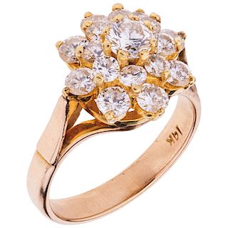 A diamond 14K yellow gold ring.  