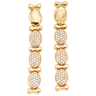 A diamond 16K yellow gold pair of earrings.