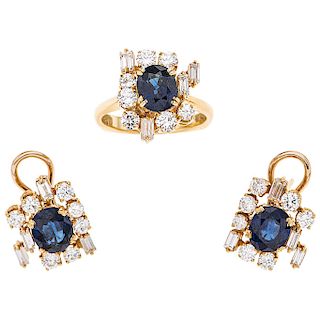 A sapphire and diamond 18K yellow gold ring pair of earrings set. 
