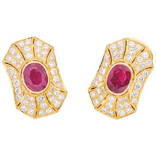 A ruby and diamond 14K yellow gold pair of earring.