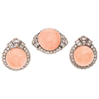 A coral and diamond palladium silver ring and pair of earrings set. 