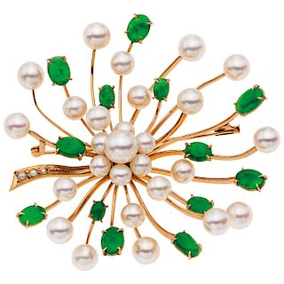 A jade and cultured peal 14K yellow gold brooch.