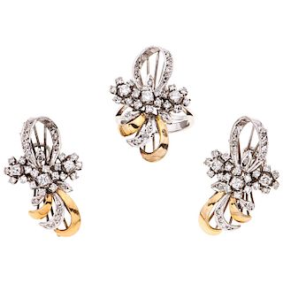A diamond palladium silver ring and pair of earrings set. 